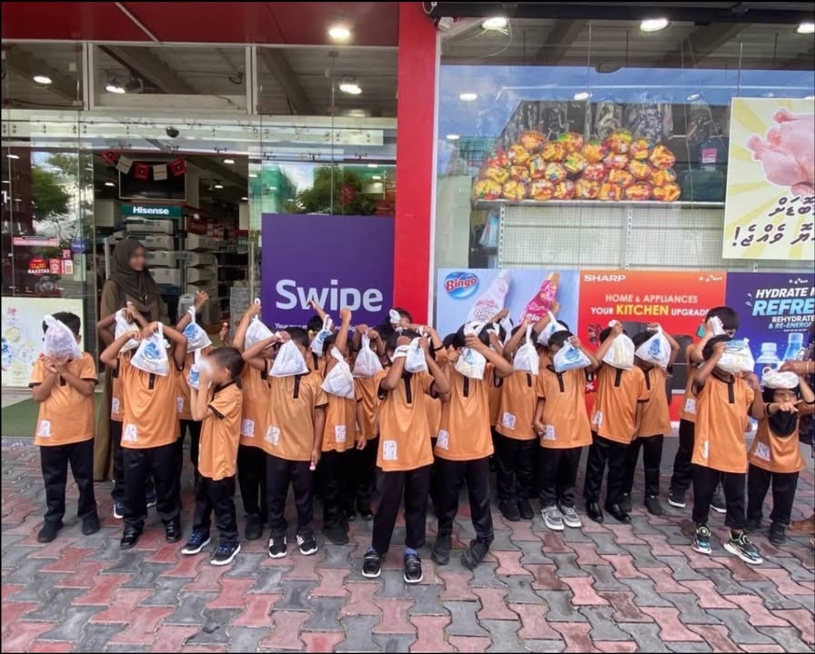 Little learners discover money and choices through hands-on shopping experience