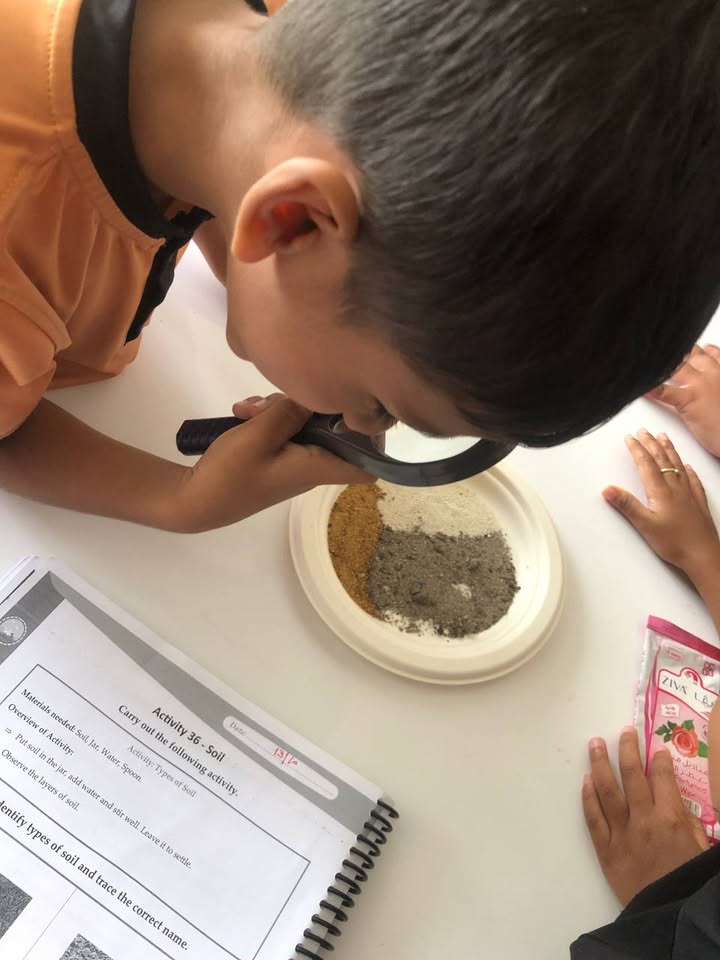 Young learners discover soil mysteries through hands-on exploration and observation