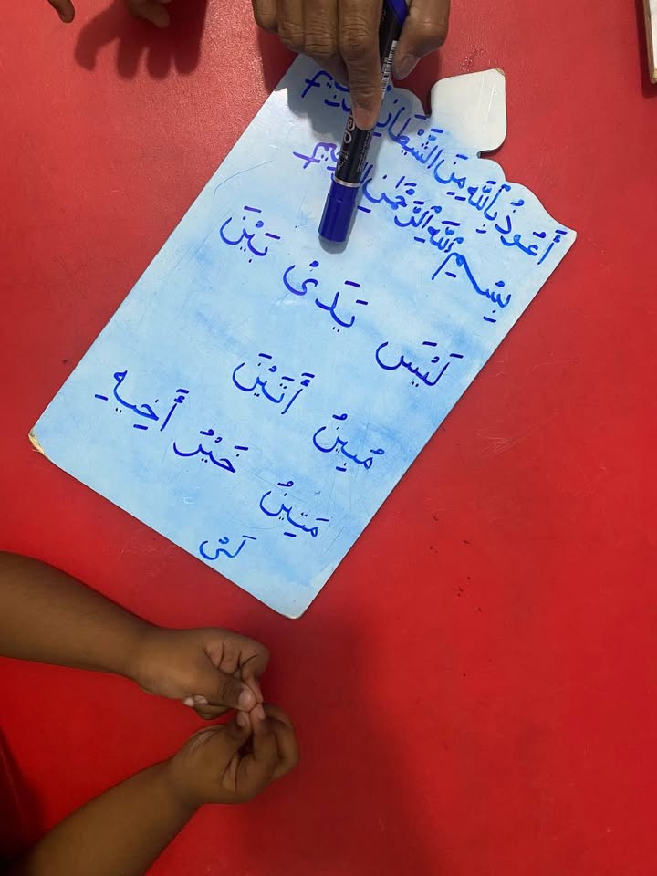 Young students master Quran learning through daily guided practice and support